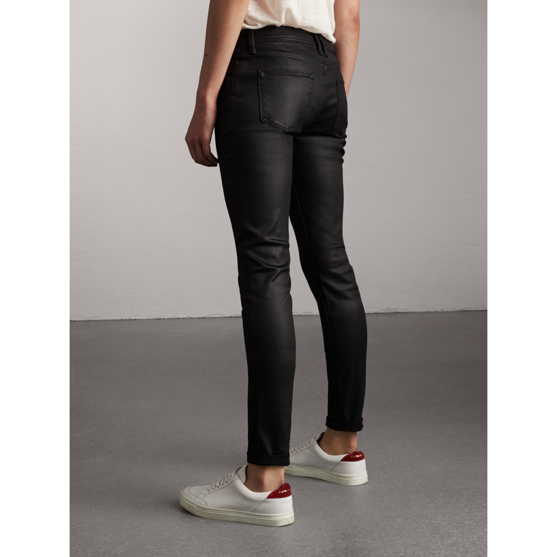 Womens black coated jeans