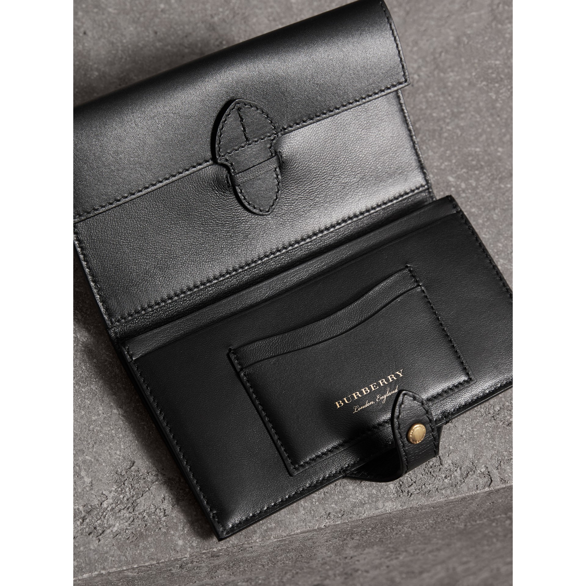 Riveted Equestrian Shield Leather Continental Wallet in Black - Women ...