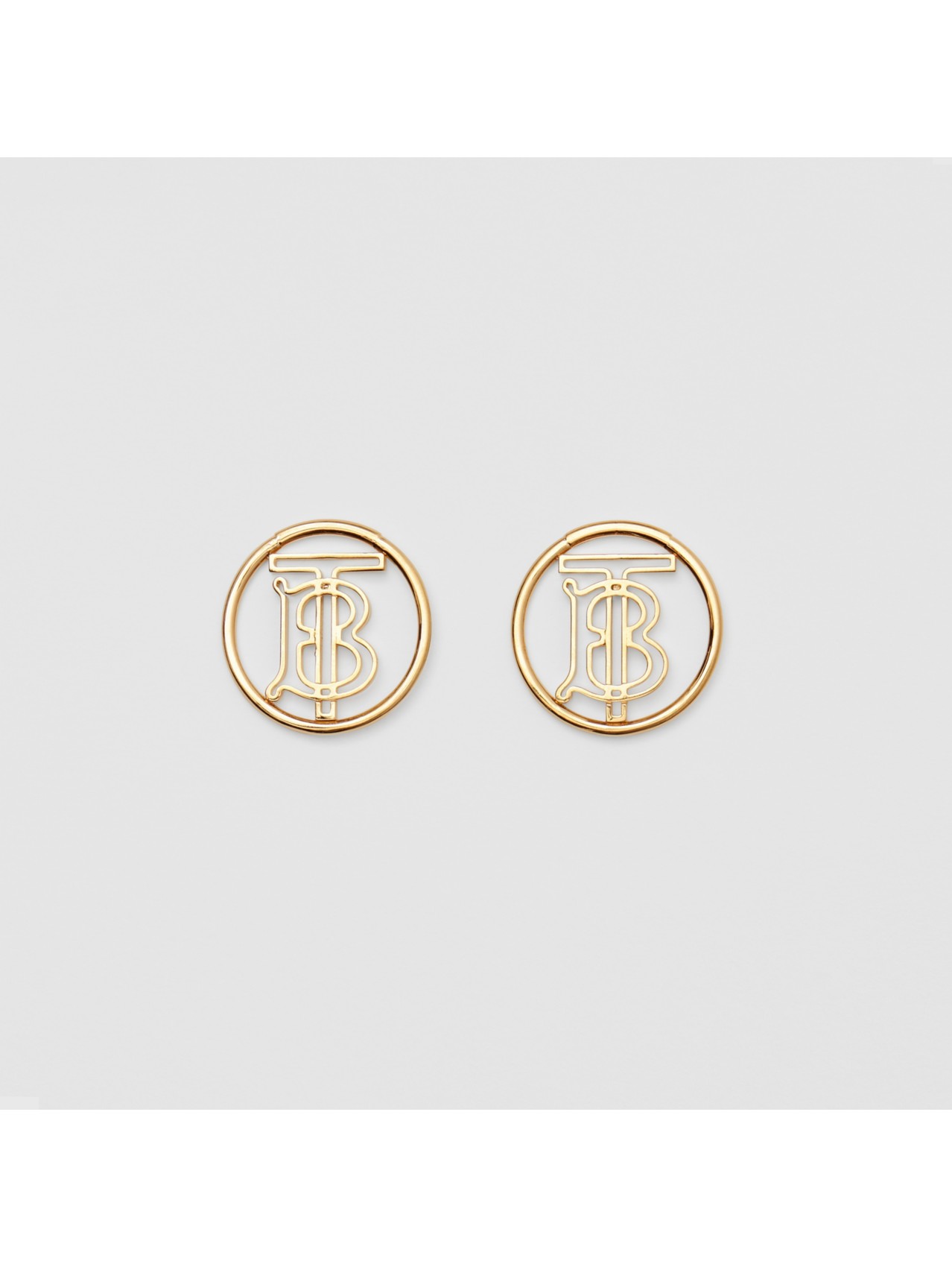 gold-plated monogram motif earrings in light